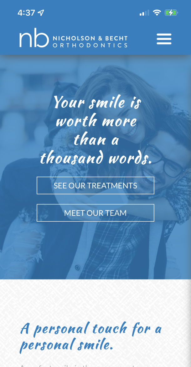 Screengrab of the mobile website with text 'Your smile is worth more than a thousand words'
