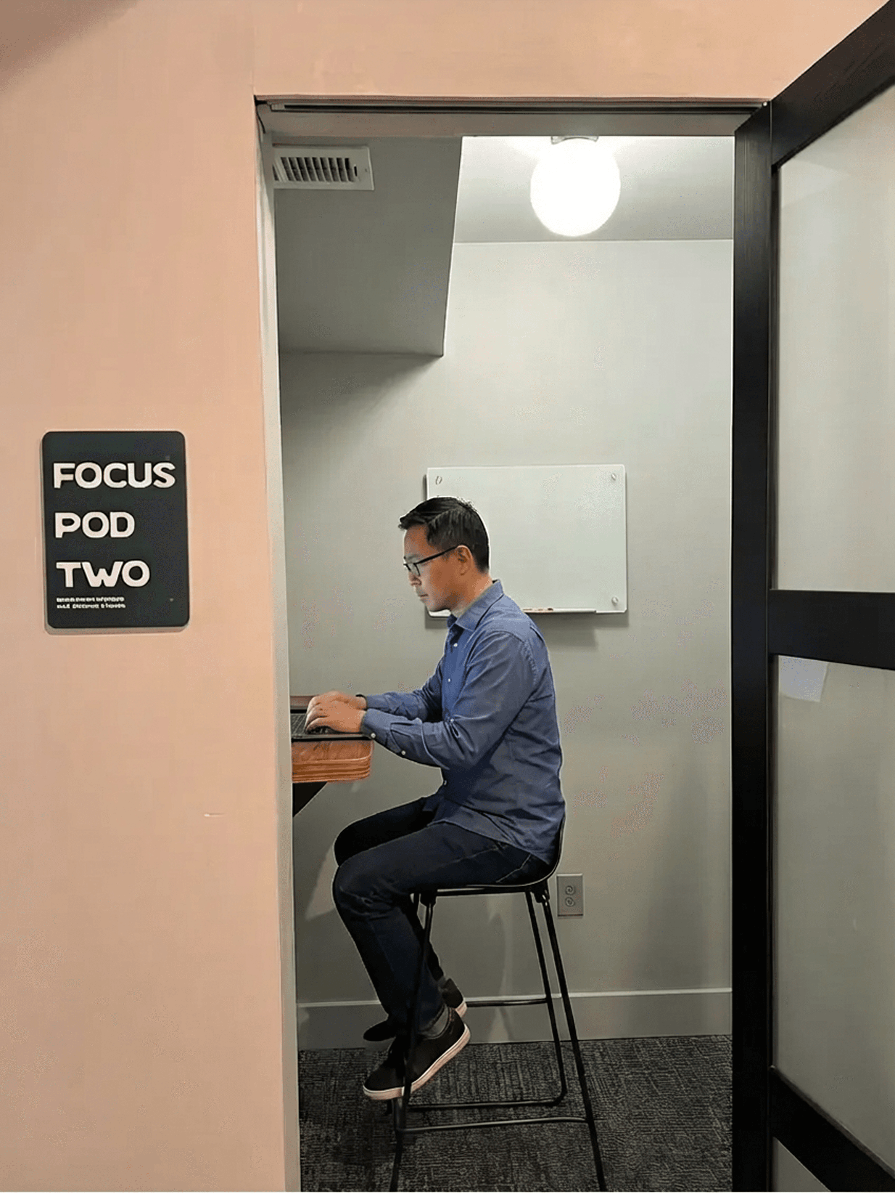 Private focus pod with team member deep in work
