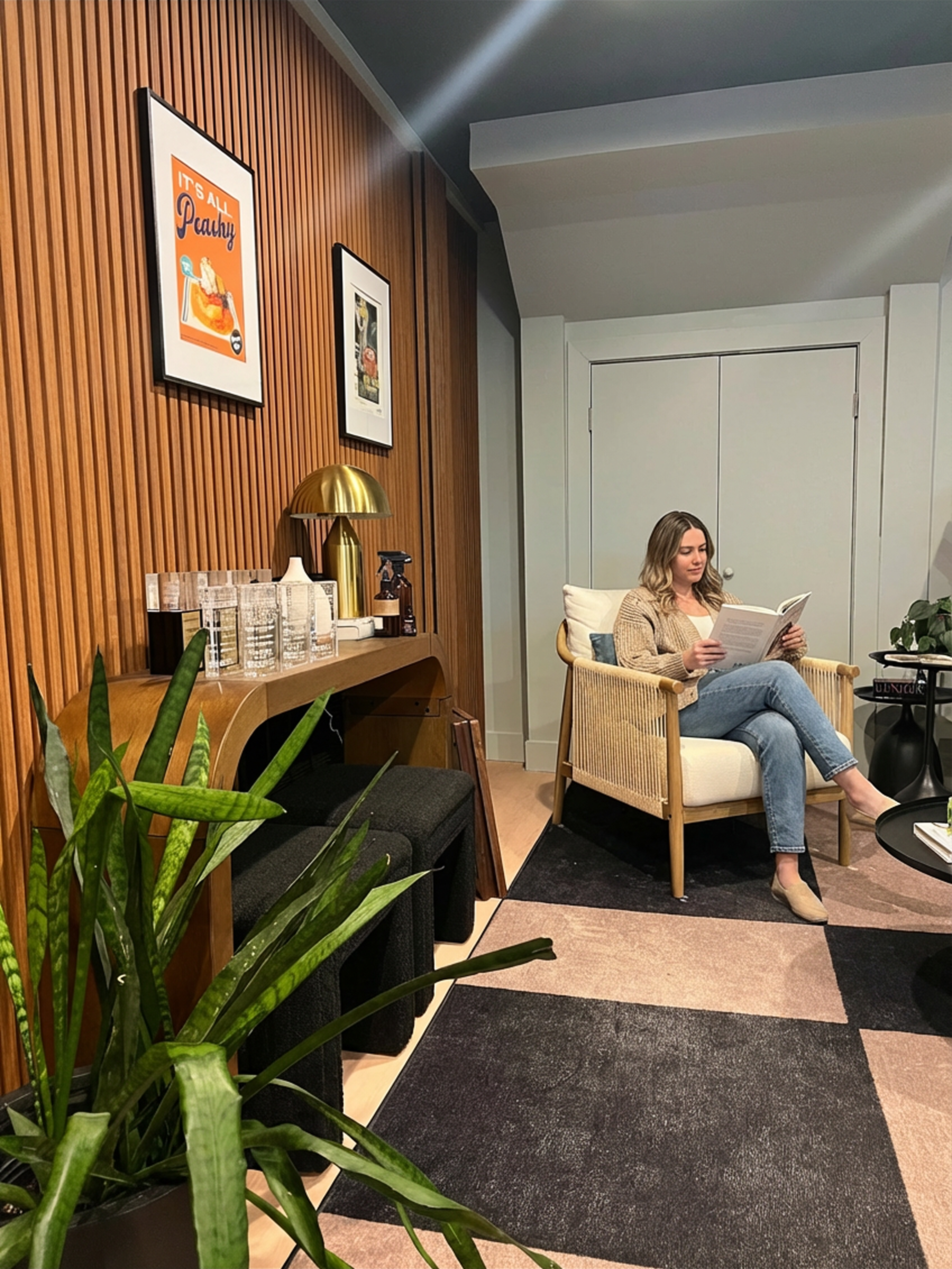 Cozy reading and lounge area with wood paneling