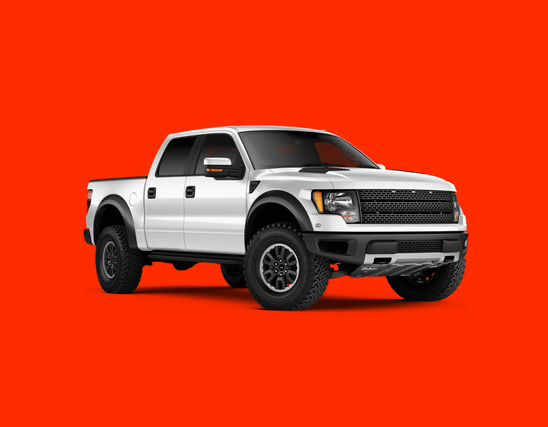White pickup truck hero image on vibrant orange background