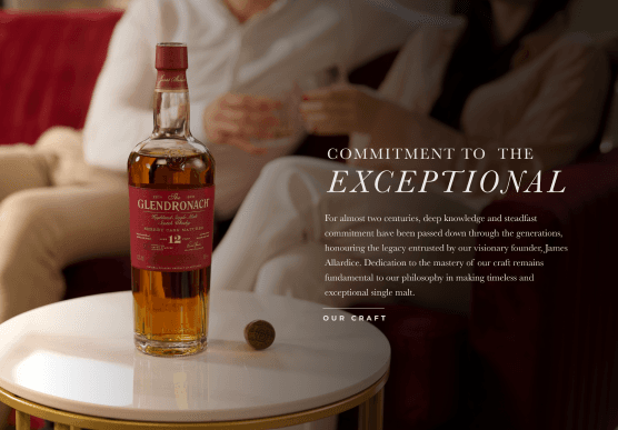 Commitment to the Exceptional section with bottle on marble table