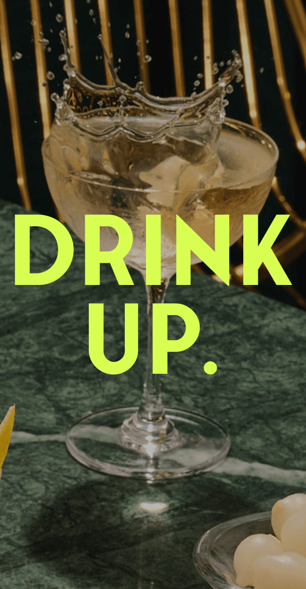 Social media story graphic with Drink Up typography over splashing martini