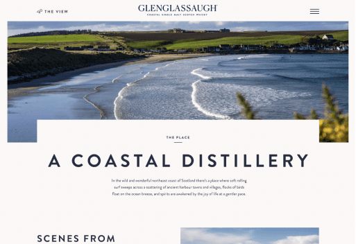Desktop page showcasing the coastal distillery with scenic views of the Scottish bay