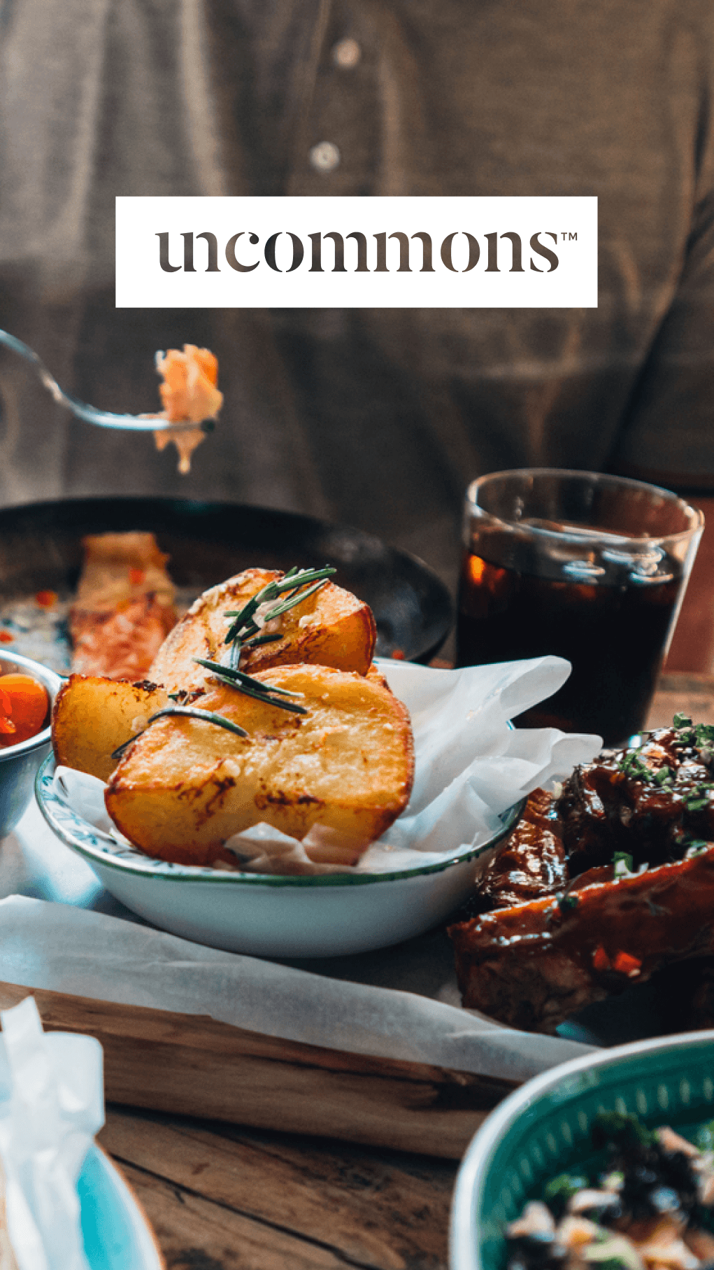 Mobile dining image featuring gourmet dishes with rosemary potatoes and glazed ribs