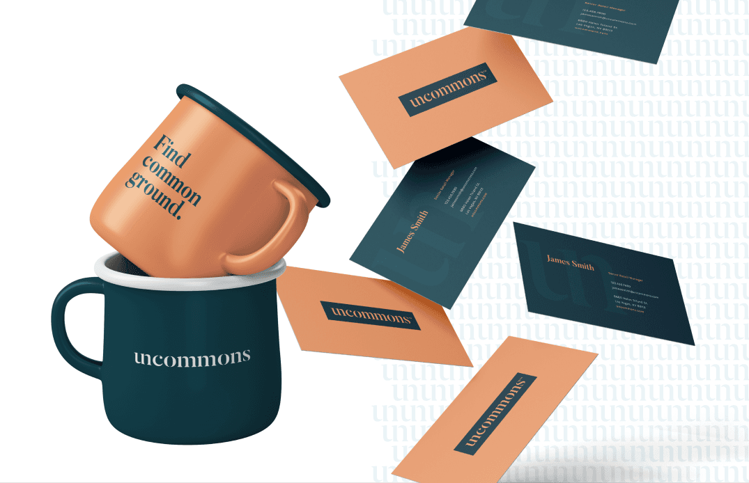 Branded merchandise collection including mugs, business cards, and stationery