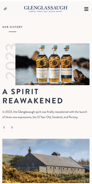 Mobile history page showing A Spirit Reawakened with three whisky expressions from 2023