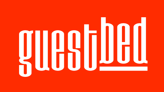 Guestbed horizontal logo with custom typography on orange background