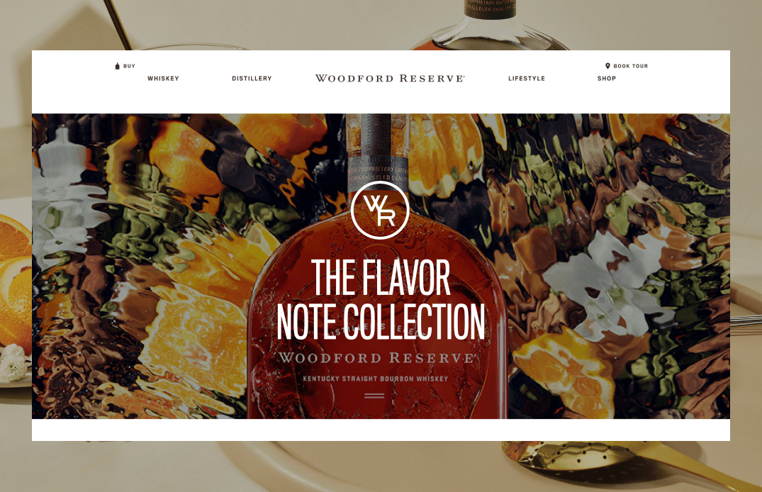 Flavor Note Collection hero section featuring Woodford Reserve bottle with colorful autumn harvest imagery
