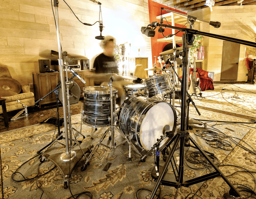 Drum kit setup in the spacious tracking room
