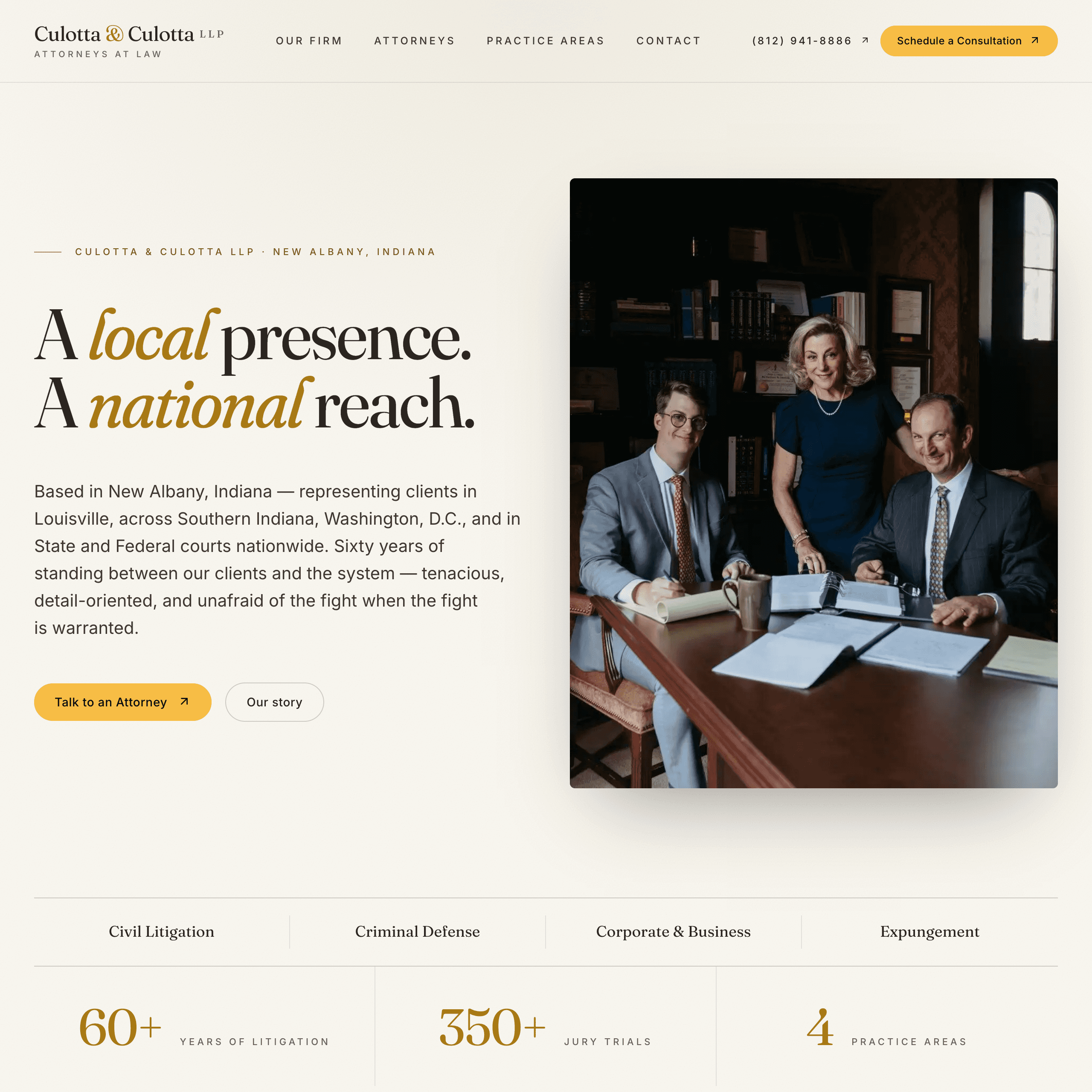 Culotta & Culotta homepage hero, “A local presence. A national reach.,” with the firm’s attorneys