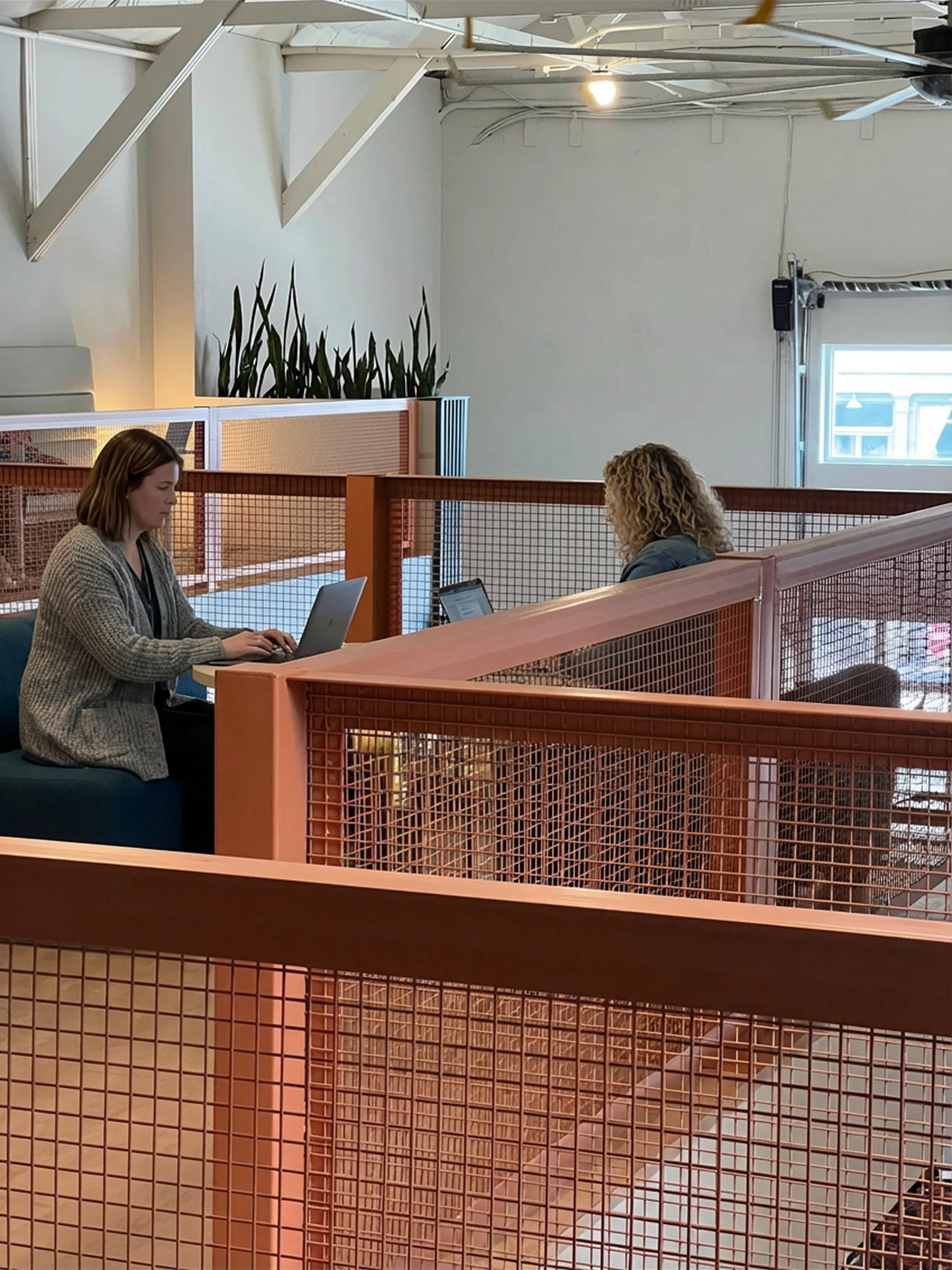 Open workspace with collaborative area and team interaction