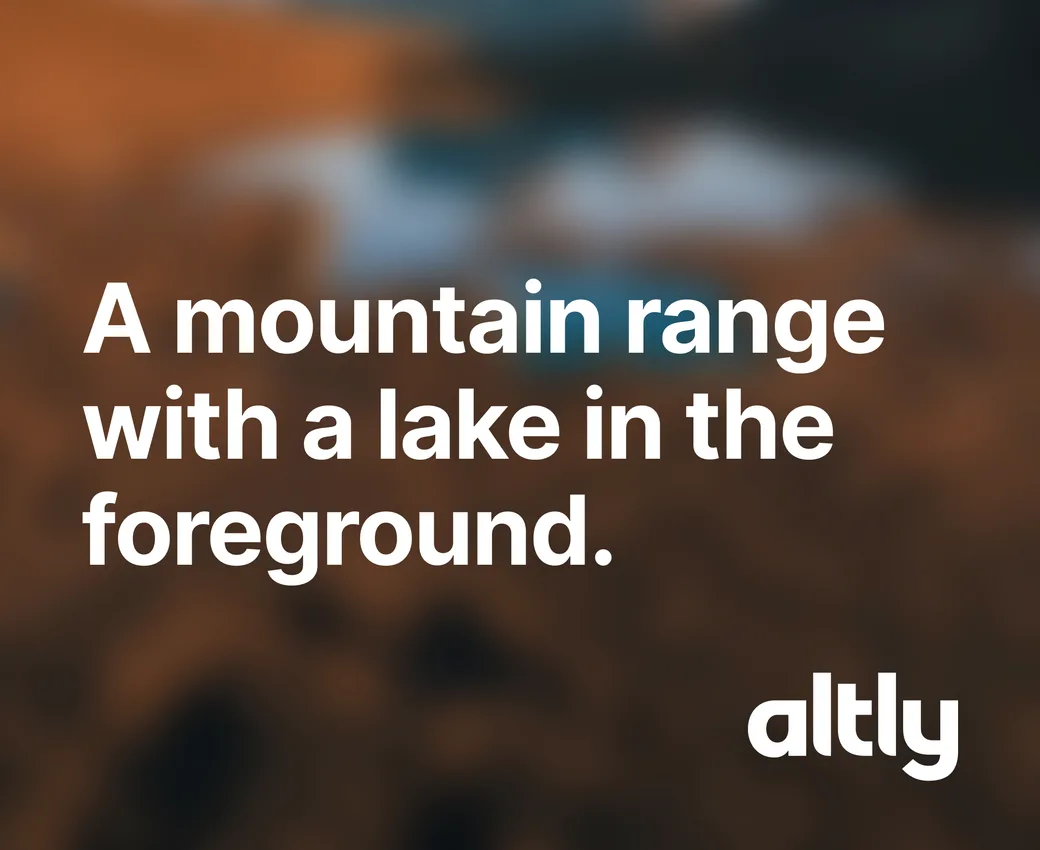 An Altly ad: a blurred photo, captioned “A mountain range with a lake in the foreground.”